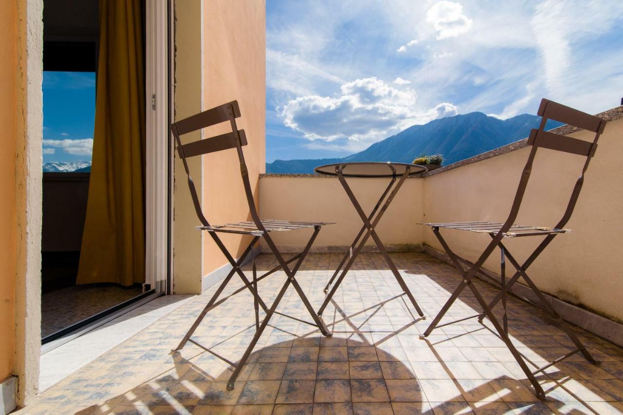 Al Pontile - The House Of Travelers Villa Sala Comacina Luaran gambar
